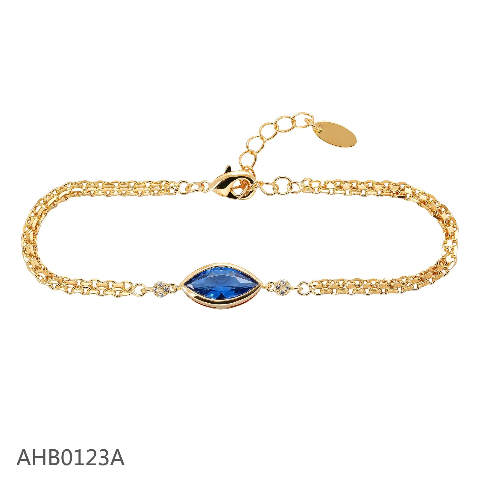 Gold bracelet with a blue marquise focal stone