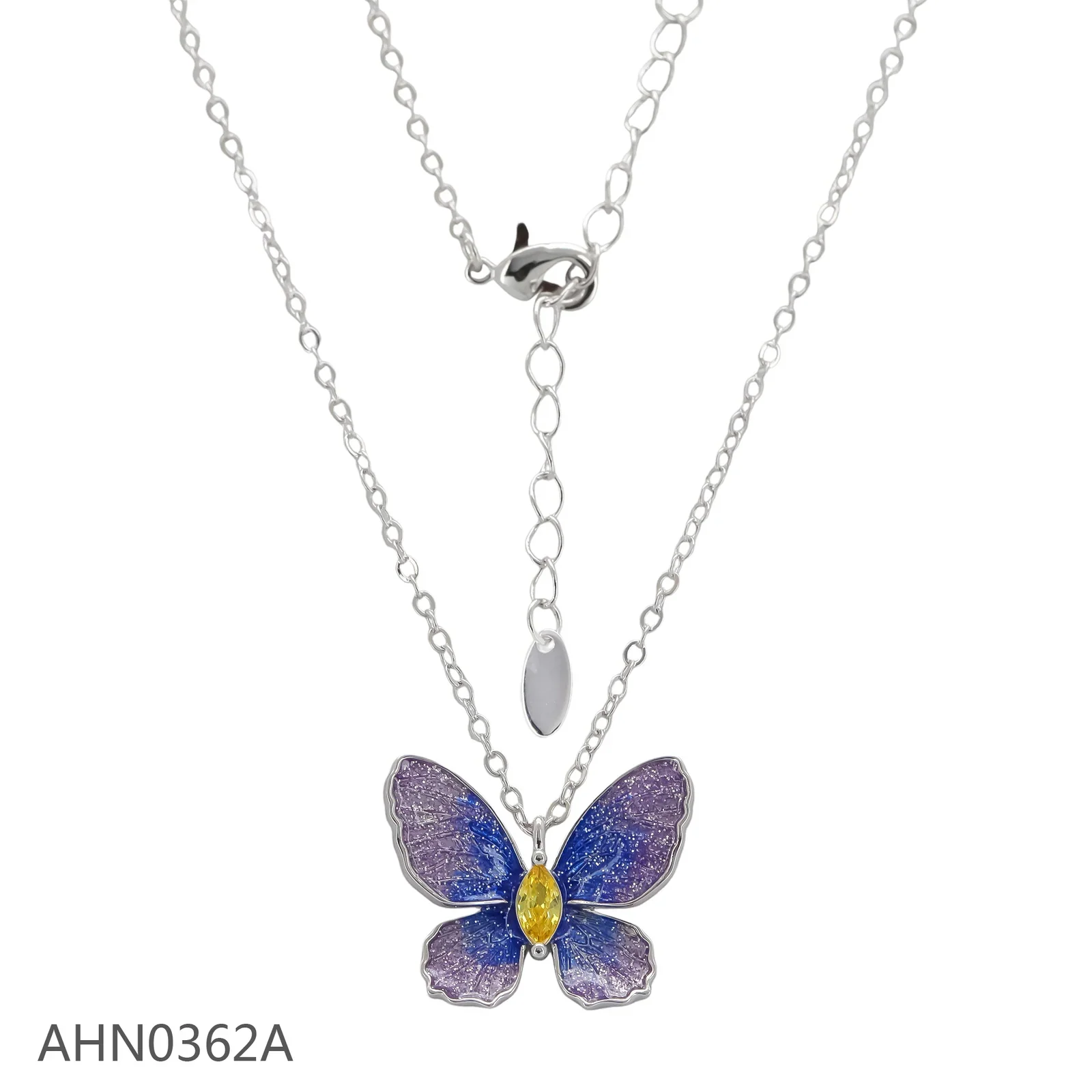 Silver-tone necklace with a purple and blue butterfly pendant and yellow center stone