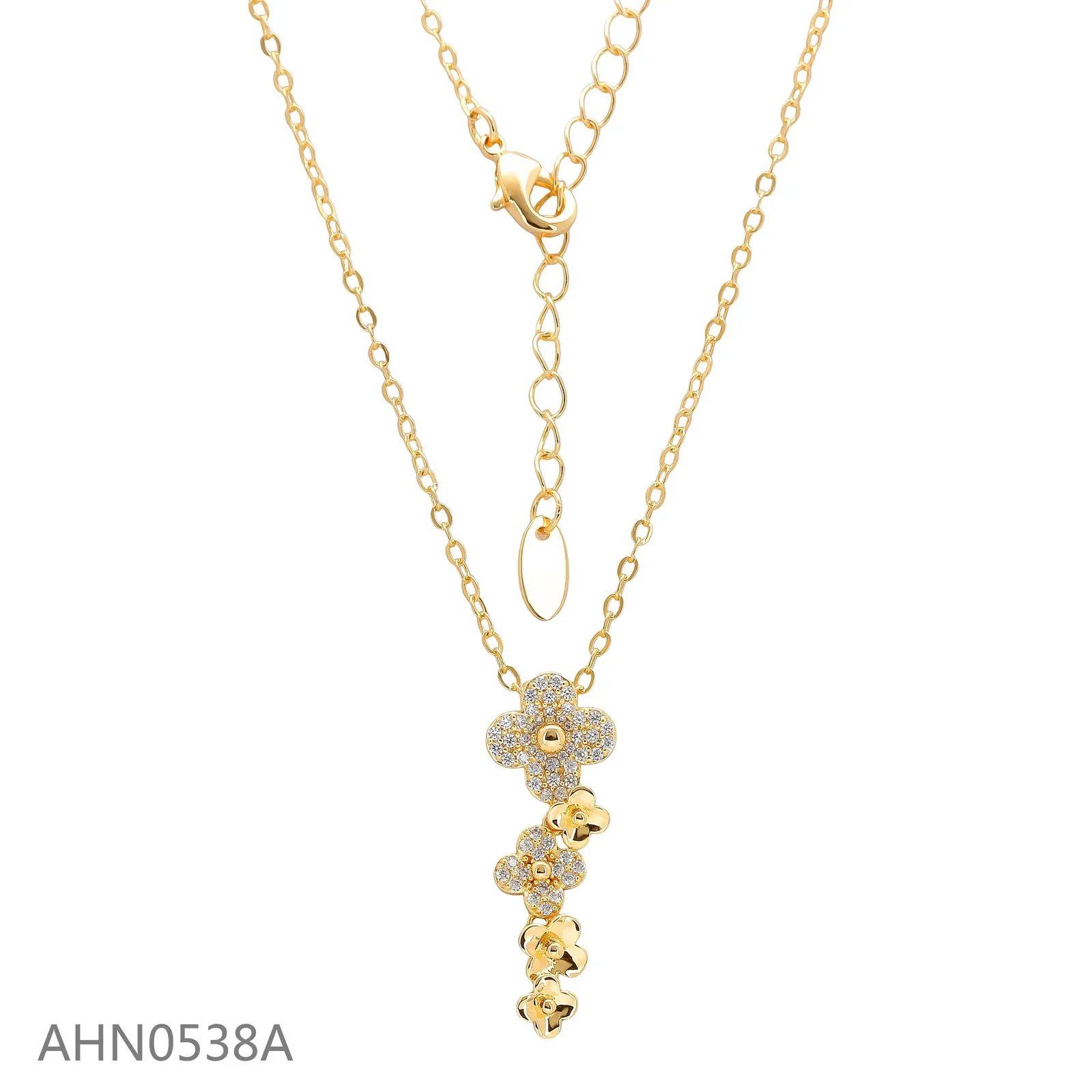 Gold-tone necklace with a vertical floral pendant and clear stone accents