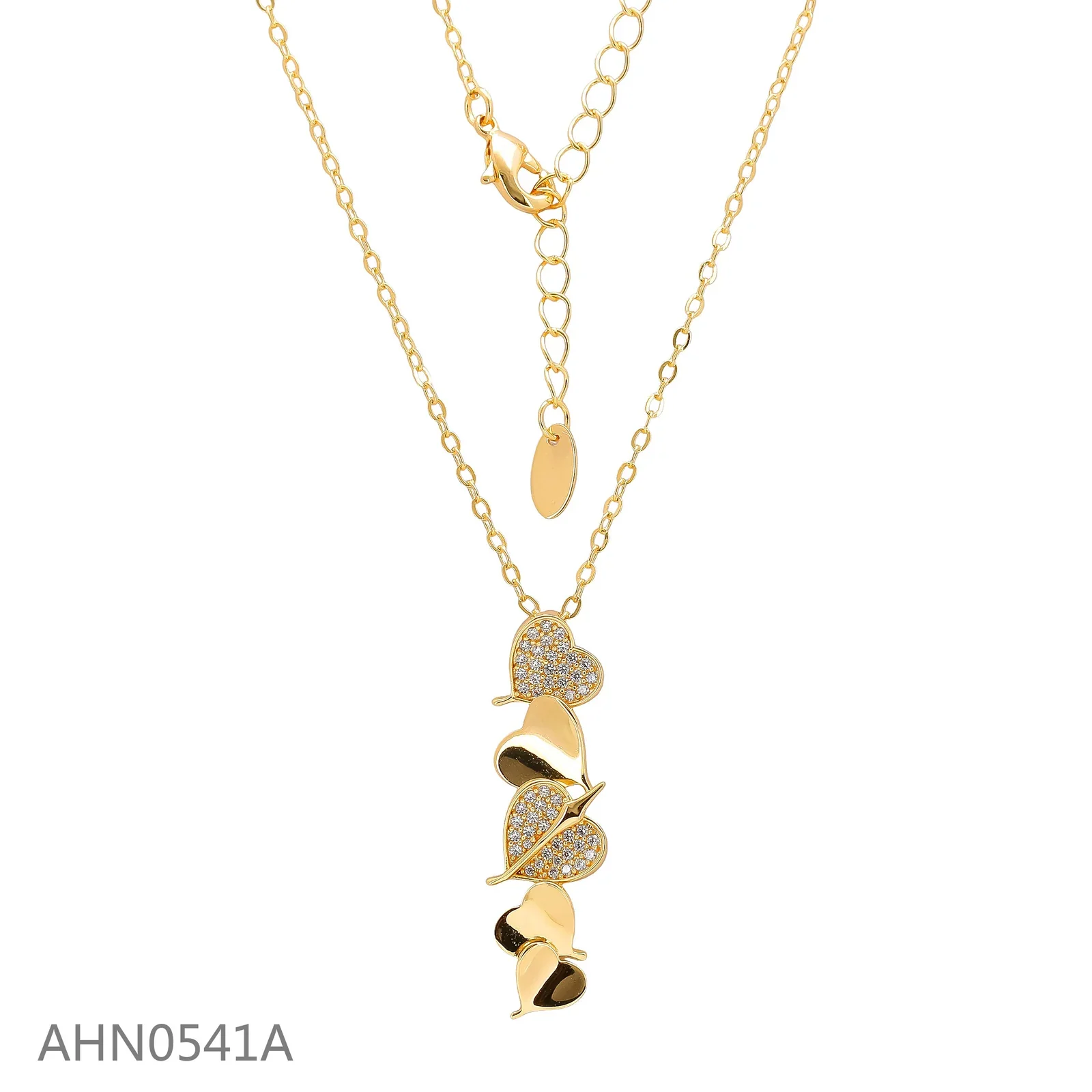 Gold-tone necklace with a curved leaf-like pendant and clear stone accents