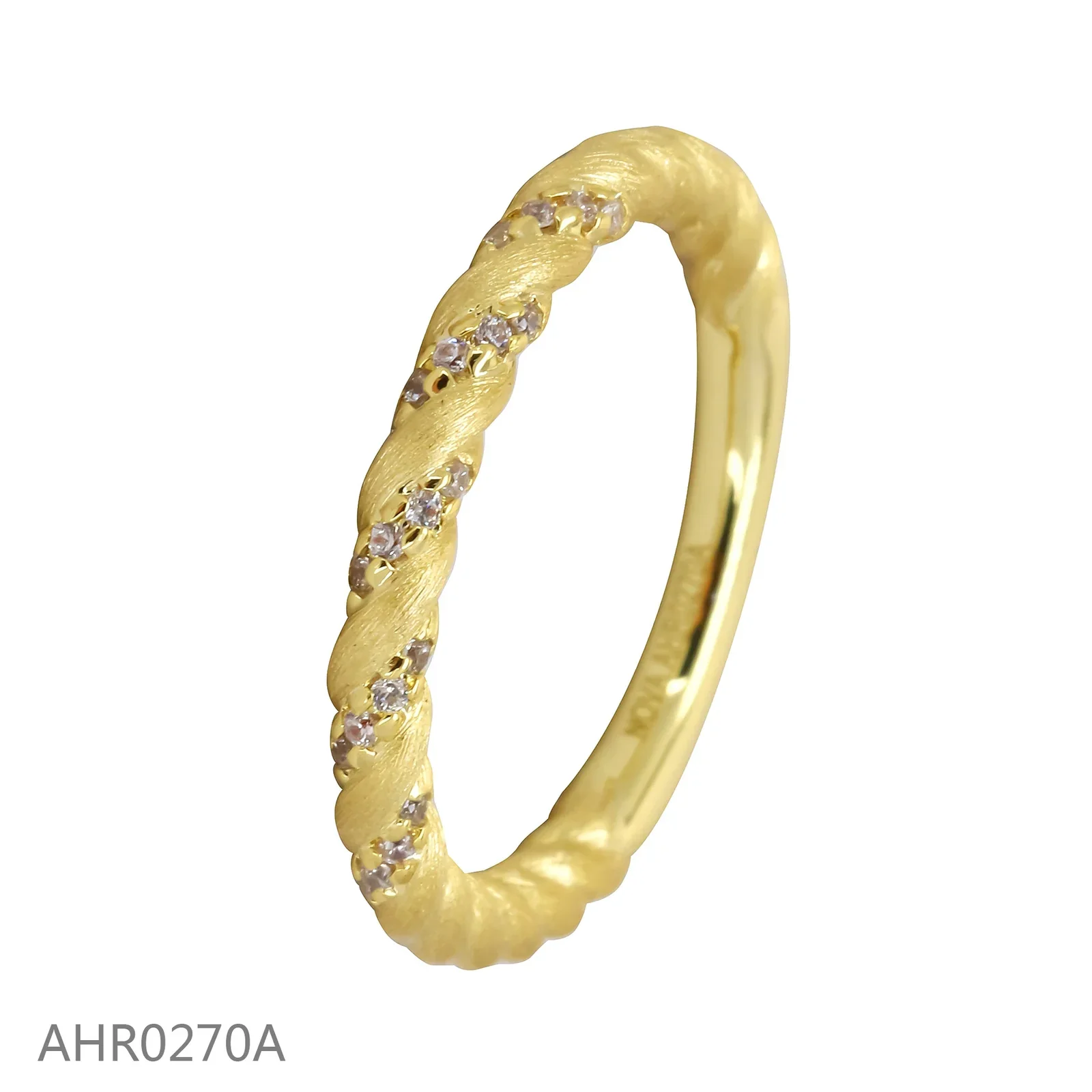 Twisted ring with fine textured surfaces