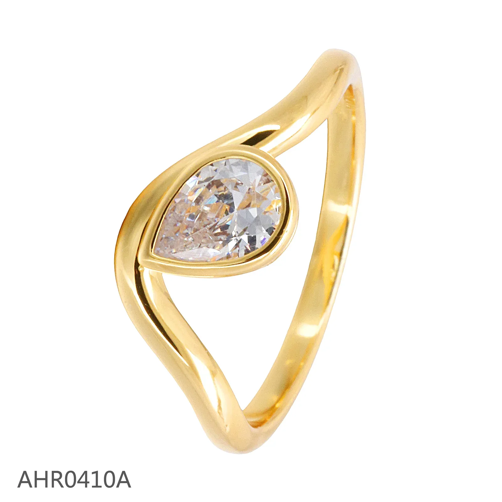 Gold-tone open ring with a horizontally set clear pear-shaped stone
