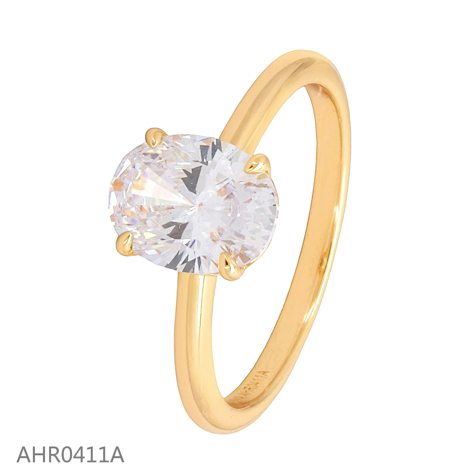 Gold-tone solitaire ring with a round clear stone in a four-prong setting