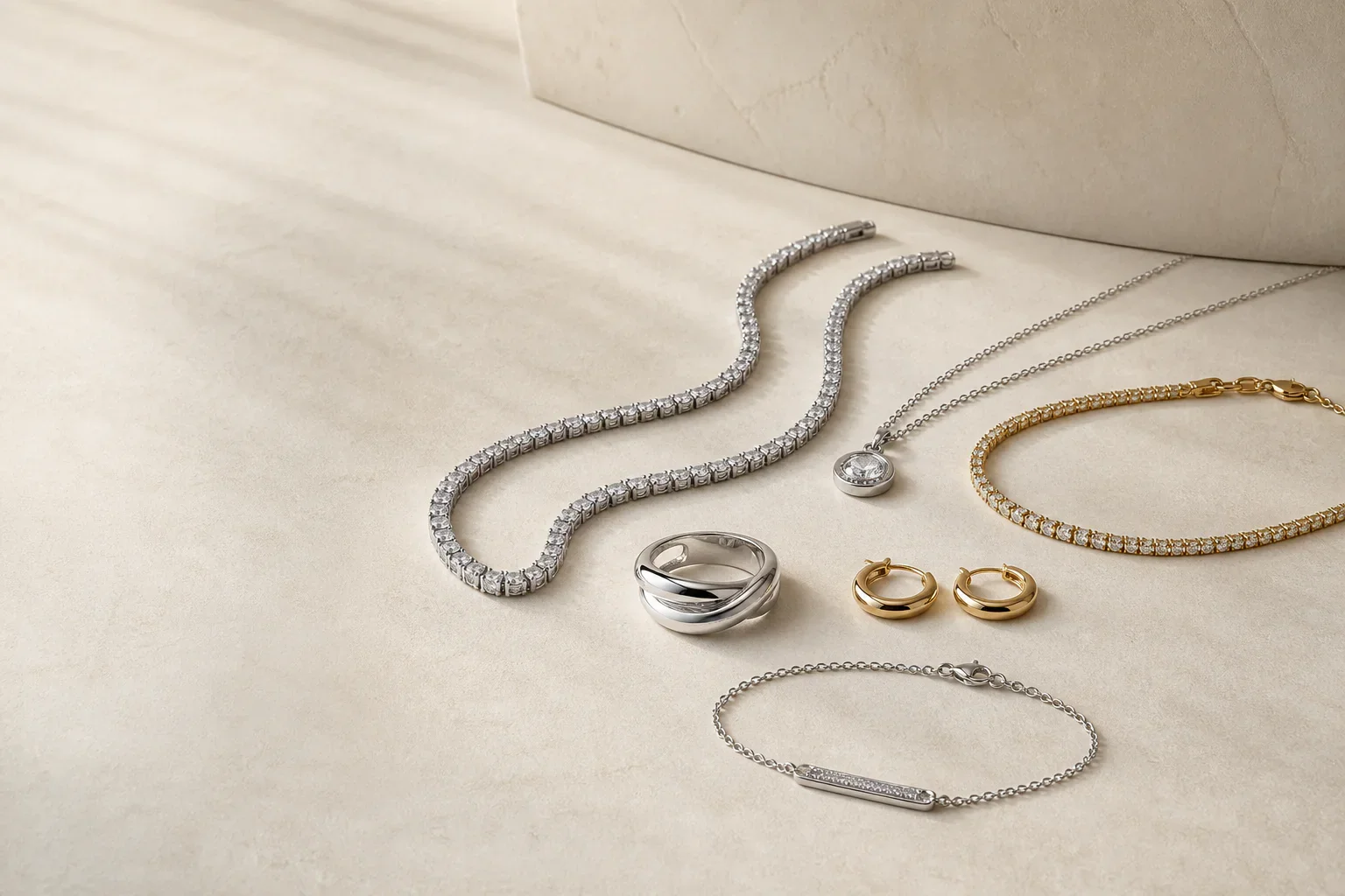 Illustrative mix of silver-tone and gold-tone necklaces, earrings, rings and bracelets