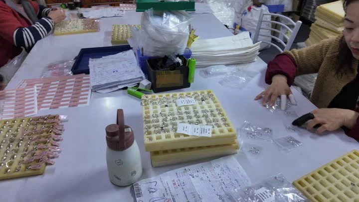 Jewelry being reviewed before pack-out