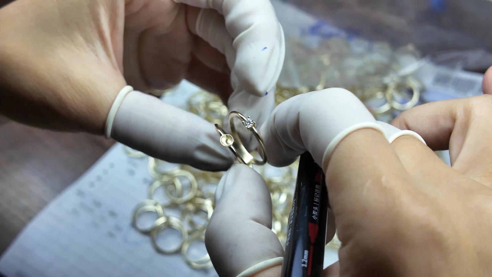 A finished jewelry item being reviewed at NOVA