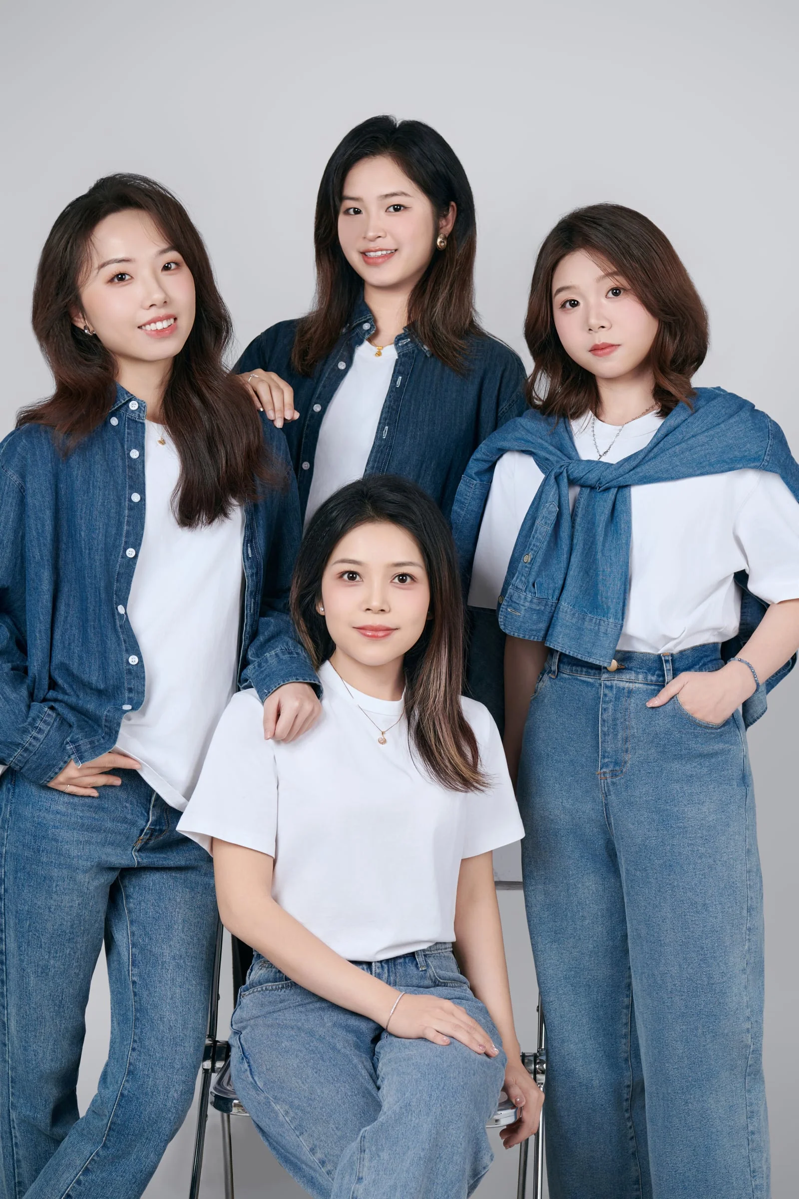 Four members of the NOVA team in a standing group portrait